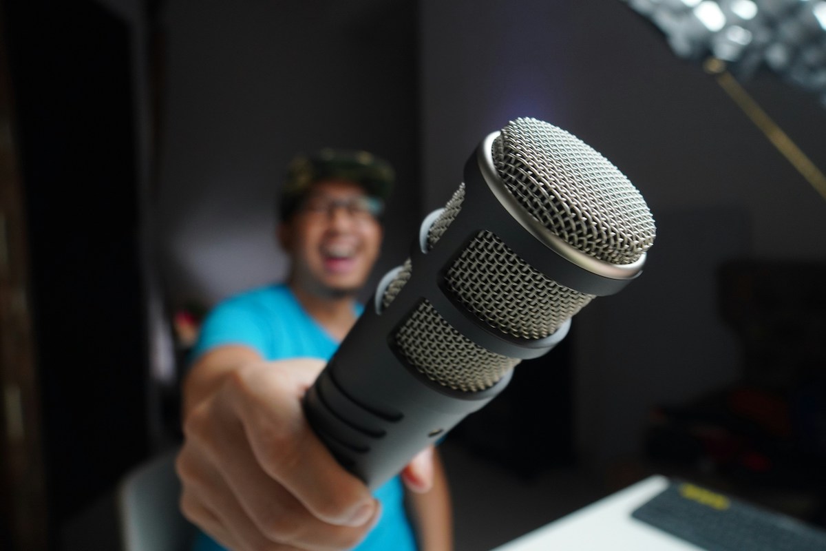 a man holding a microphone