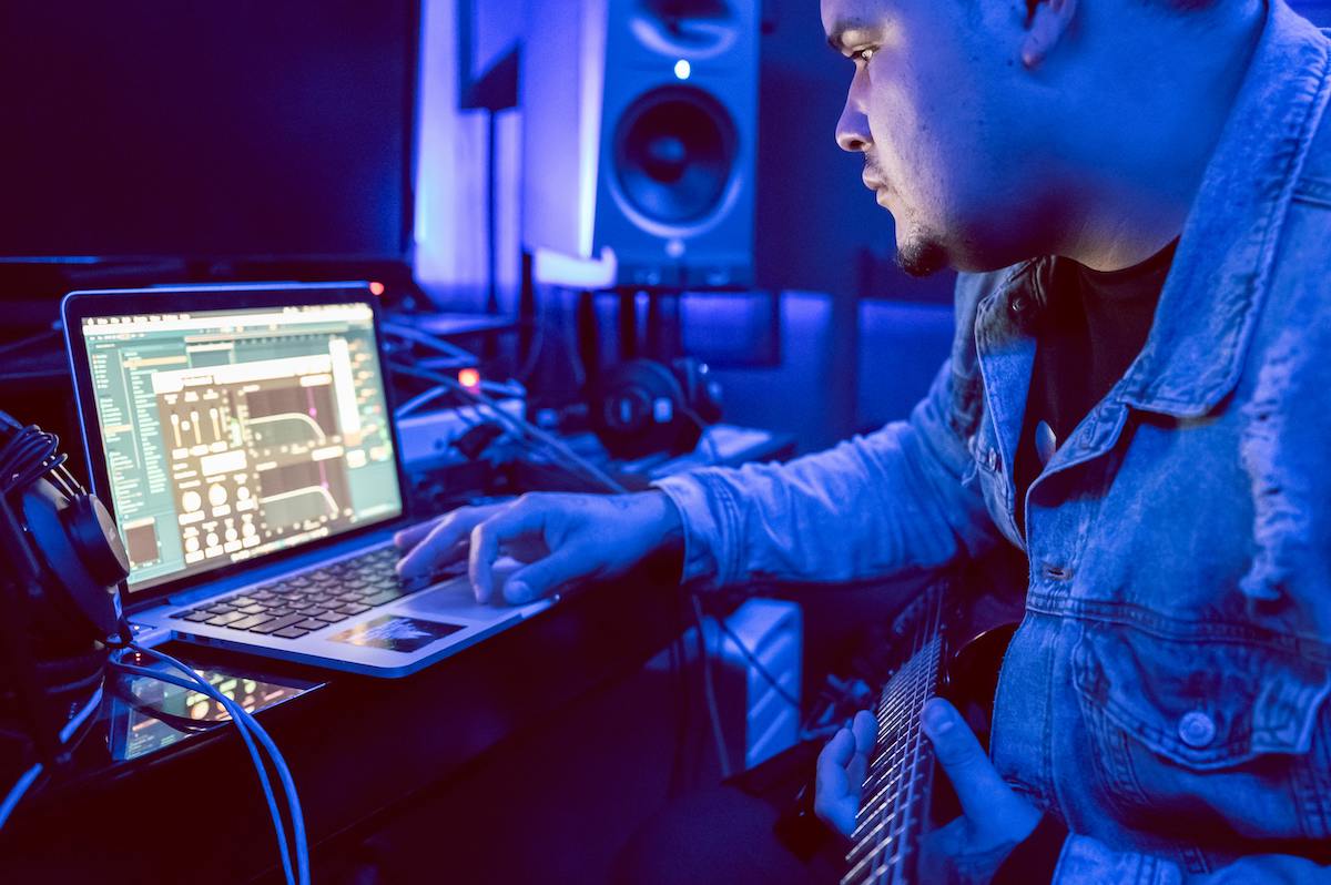 Photo Of Man Using Laptop for eq editing 