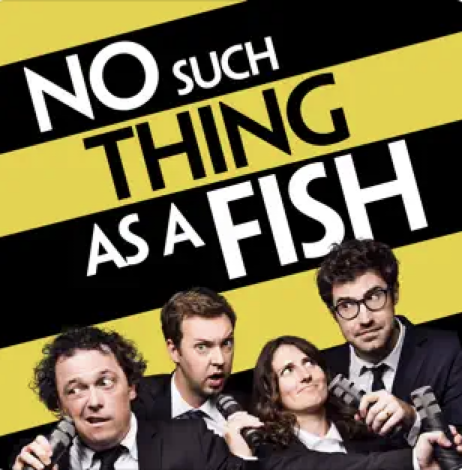 No Such Thing As a Fish cover image showing the four hosts in suits holding microphones.