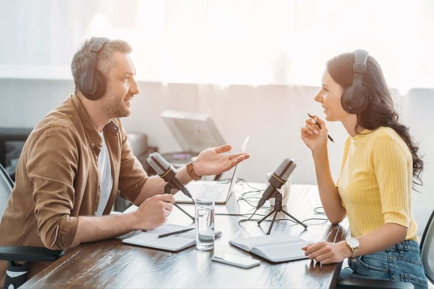 Image of two podcasters engaging in deep conversation