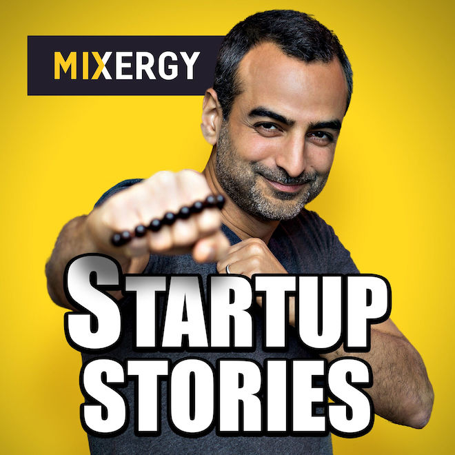 Startup Stories cover photo featuring an image of Andrew Warner punching the screen while holding rosary beads.